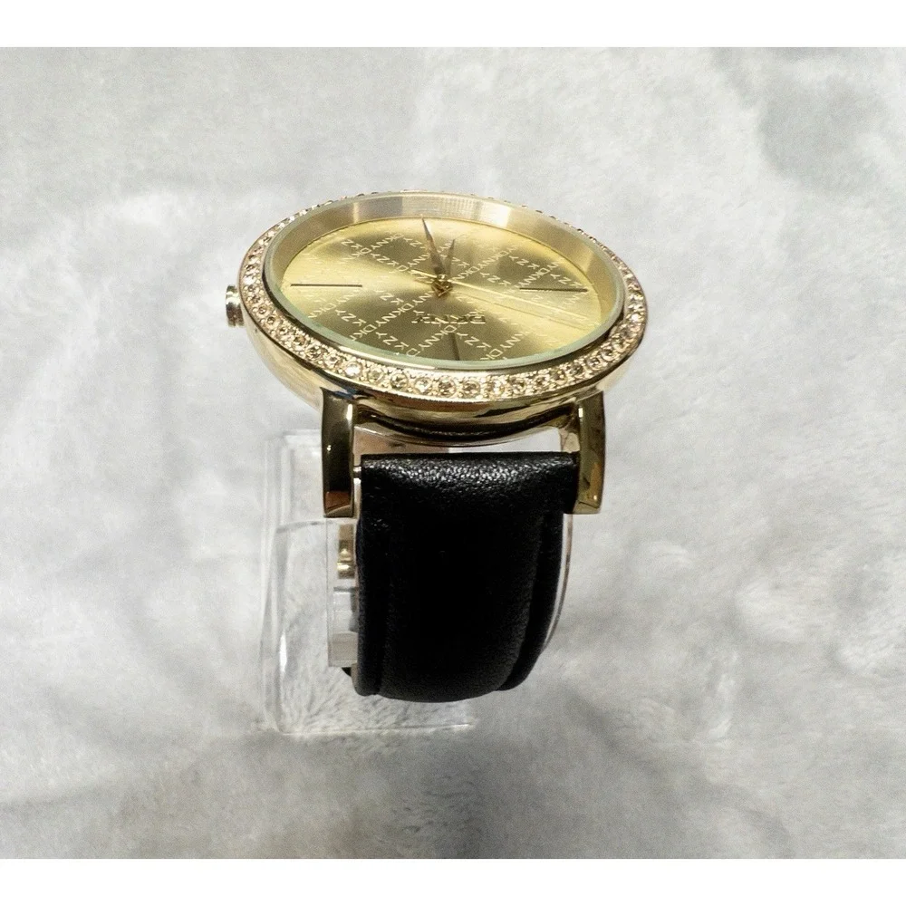 DKNY 111007 Gold Tone All Over Logo Womens 43mm Wristwatch Gem Set Bezel